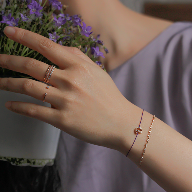 "D" string bracelet